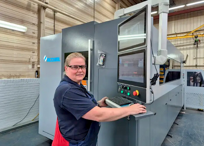 Operator of the laser cutting system after successful training